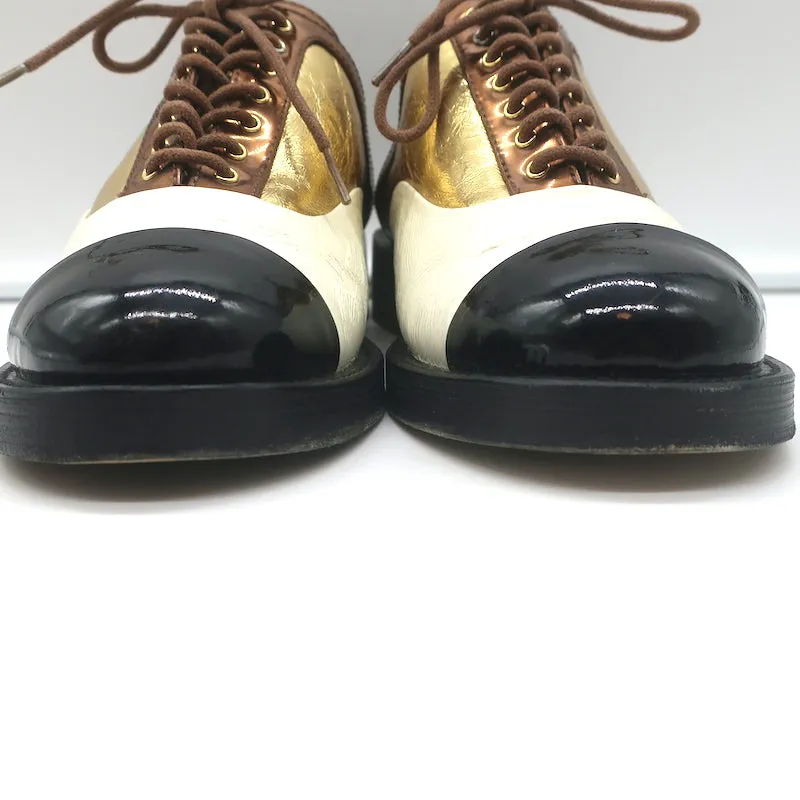 Chanel Cuba Oxford Mules Gold/Cream/Black Leather Size 38C Backless Flats