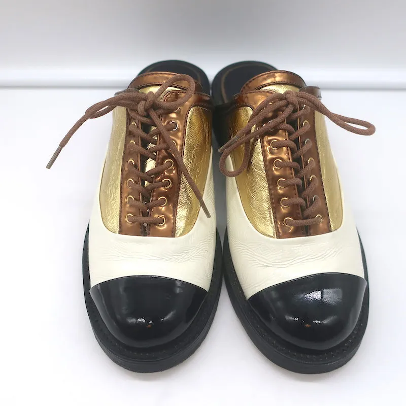 Chanel Cuba Oxford Mules Gold/Cream/Black Leather Size 38C Backless Flats